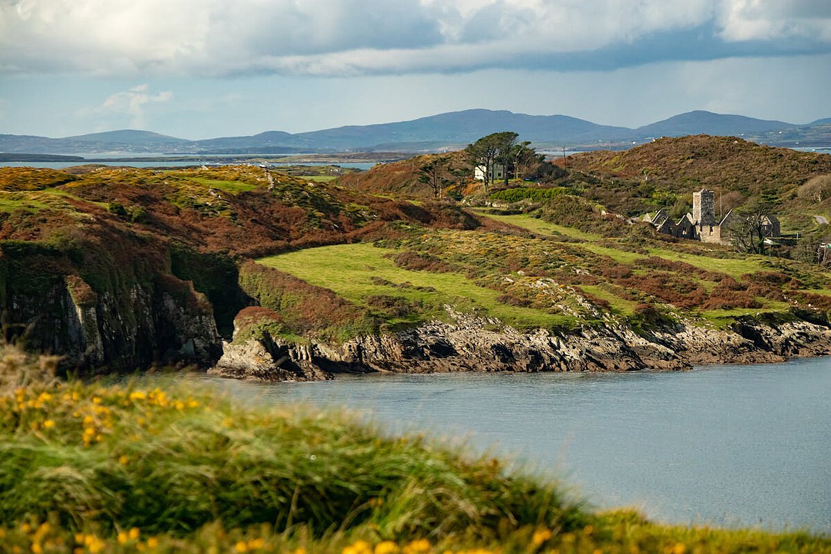 A typical Irish landscape with hills and sea views.